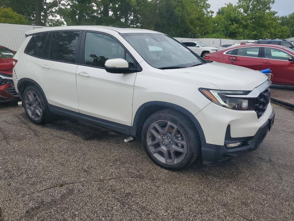 Photo 4 from auction – 2022 HONDA PASSPORT with VIN 5FNYF7H50NB006254