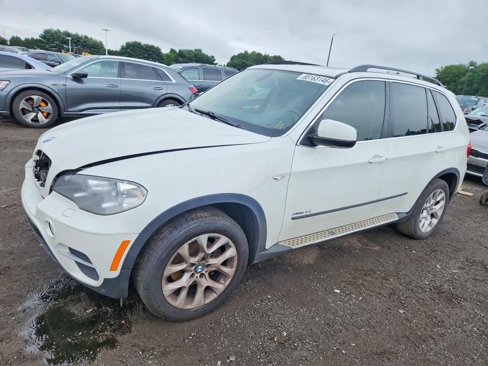 BMW X5 2013 with VIN 5UXZV4C53D0B17053 - Photo from auction