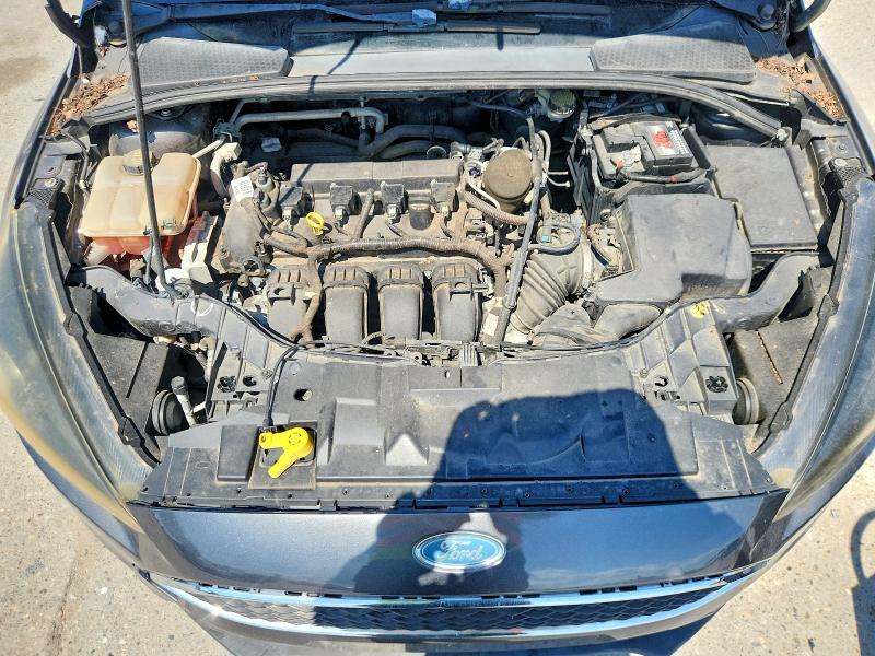 Photo 11 from auction – 2015 FORD FOCUS with VIN 1FADP3F27FL230400