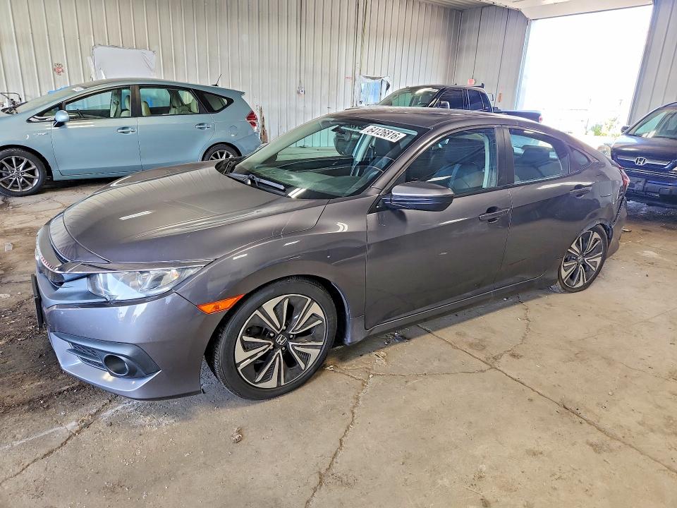 HONDA CIVIC 2016 with VIN 19XFC1F39GE013789 - Photo from auction