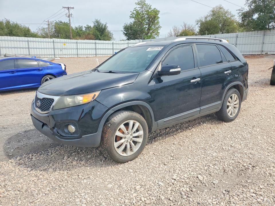 KIA SORENTO 2011 with VIN 5XYKU3A14BG029875 - Photo from auction
