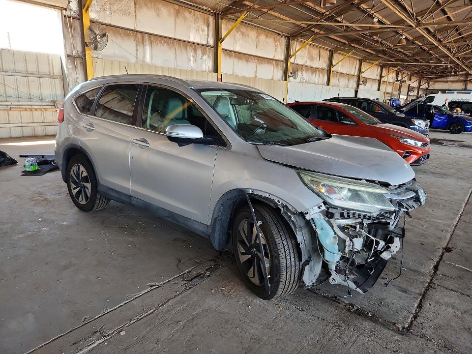 Photo 4 from auction – 2016 HONDA CR-V with VIN 5J6RM3H9XGL006682
