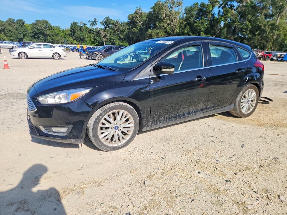 FORD FOCUS 2018 with VIN 1FADP3N27JL320611 - Photo from auction