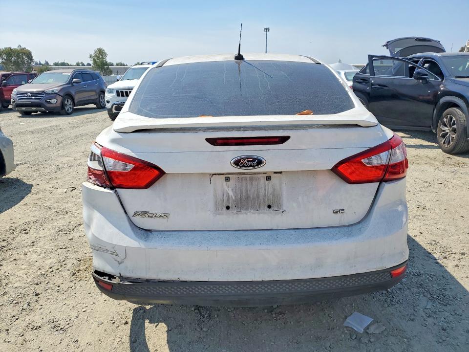 Photo 6 from auction – 2014 FORD FOCUS with VIN 1FADP3F21EL248213