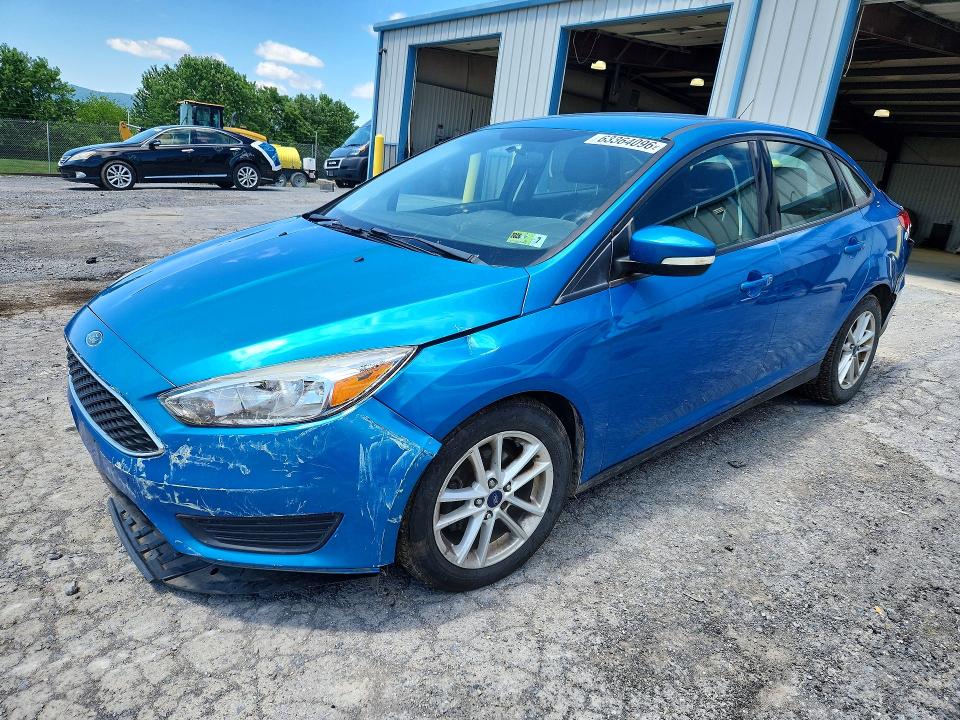 FORD FOCUS 2016 with VIN 1FADP3F23GL220321 - Photo from auction