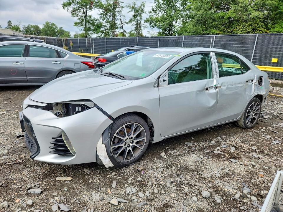 TOYOTA COROLLA 2017 con VIN 5YFBURHE1HP584086 - Foto de la subasta