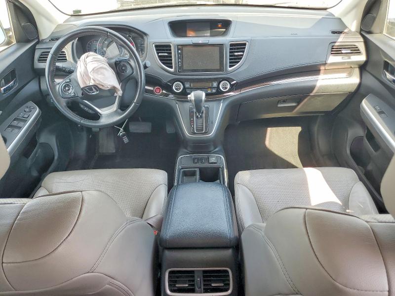 Photo 8 from auction – 2015 HONDA CR-V with VIN 2HKRM4H76FH617368