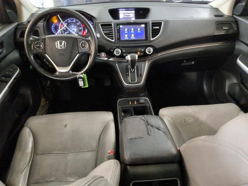 Photo 8 from auction – 2015 HONDA CR-V with VIN 2HKRM3H71FH521545