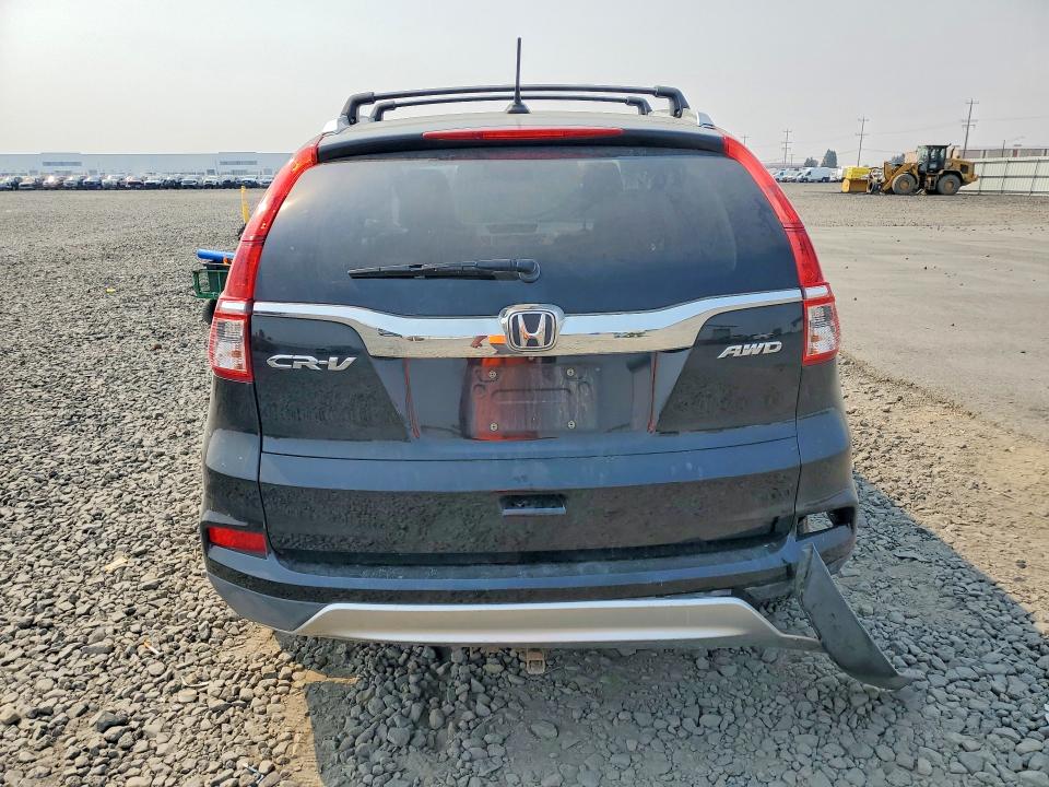 Photo 6 from auction – 2016 HONDA CR-V with VIN 5J6RM4H74GL058328