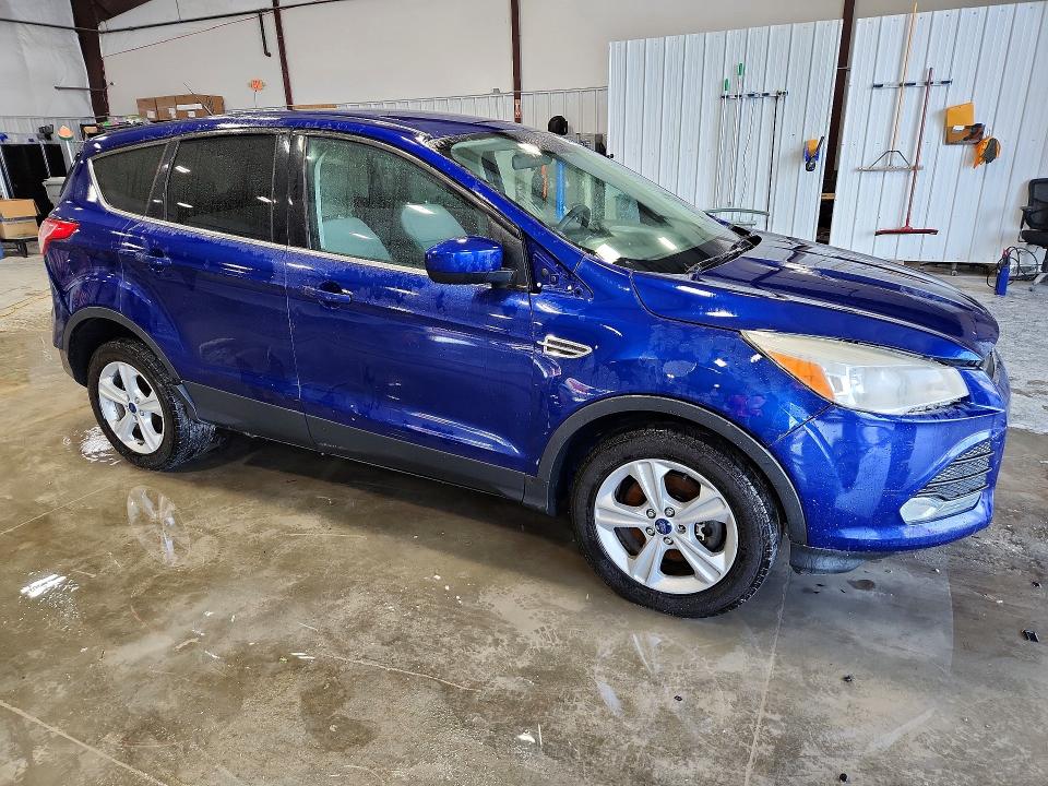 Photo 4 from auction – 2015 FORD ESCAPE with VIN 1FMCU9G94FUC31331