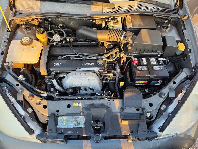 Zdjęcie 11 z aukcji – 2003 FORD FOCUS z VIN 1FAFP38323W224948