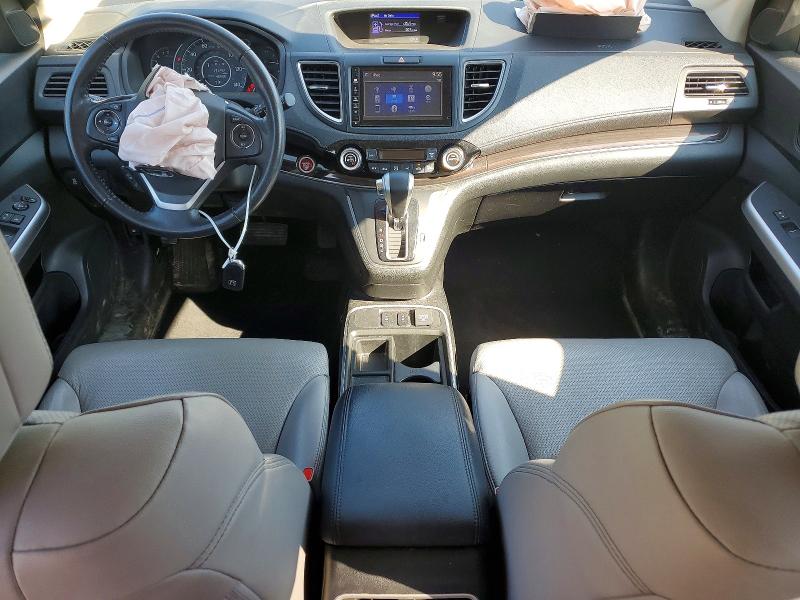 Photo 8 from auction – 2015 HONDA CR-V with VIN 5J6RM4H78FL075552