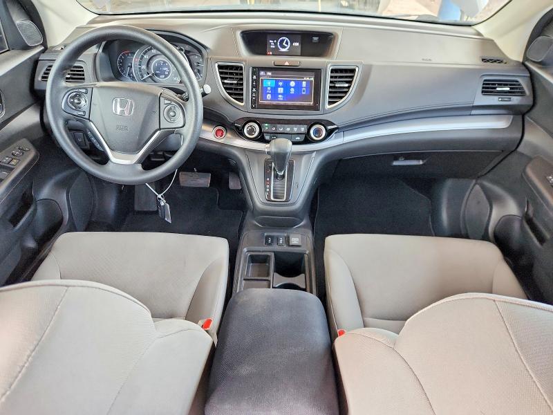 Photo 8 from auction – 2015 HONDA CR-V with VIN 3CZRM3H58FG706466