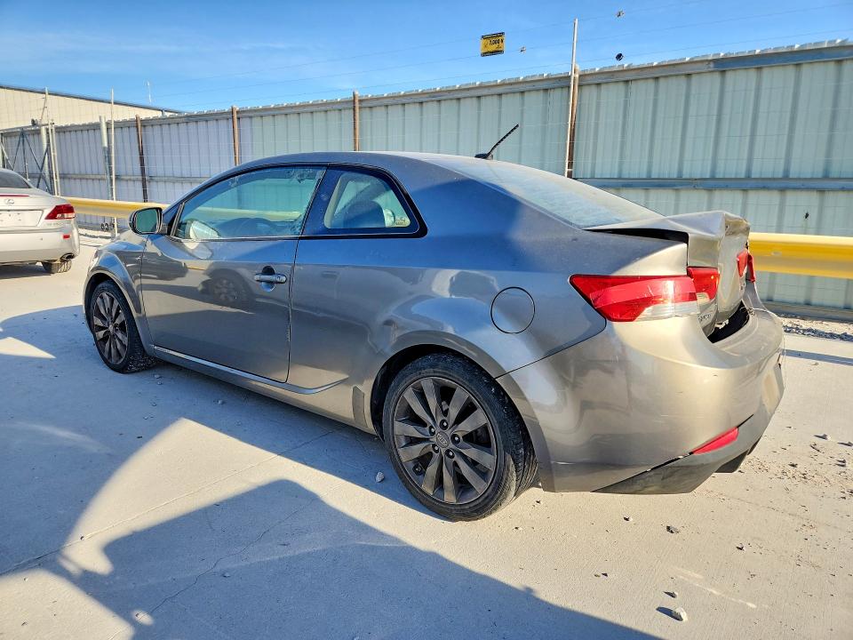 Photo 2 from auction – 2011 KIA FORTE with VIN KNAFW6A33B5330299