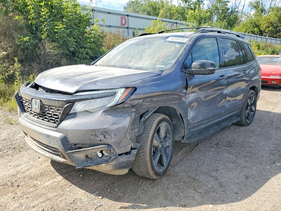 HONDA PASSPORT 2021 with VIN 5FNYF8H01MB030099 - Photo from auction