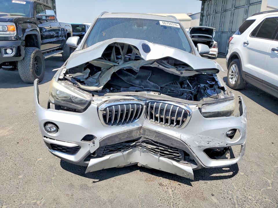 Photo 5 from auction – 2017 BMW X1 with VIN WBXHU7C34H5H34182