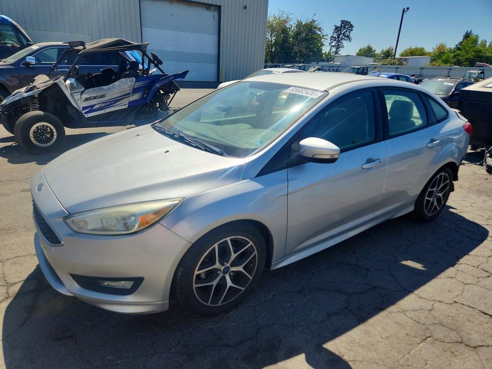 FORD FOCUS 2015 with VIN 1FADP3F20FL268017 - Photo from auction