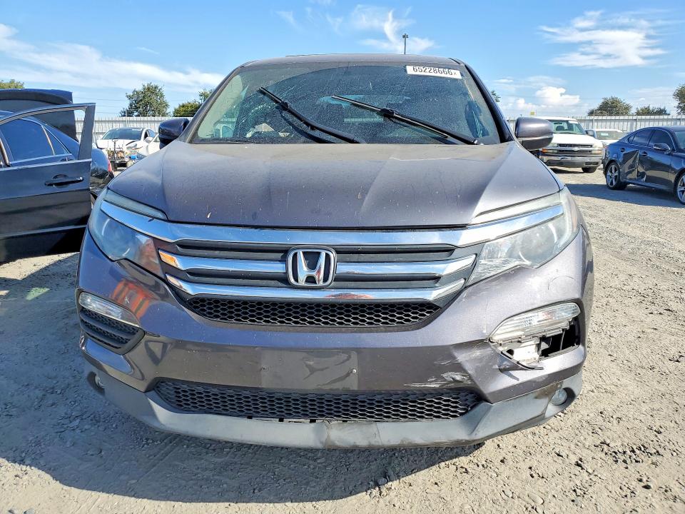 Photo 5 from auction – 2018 HONDA PILOT with VIN 5FNYF6H51JB027943