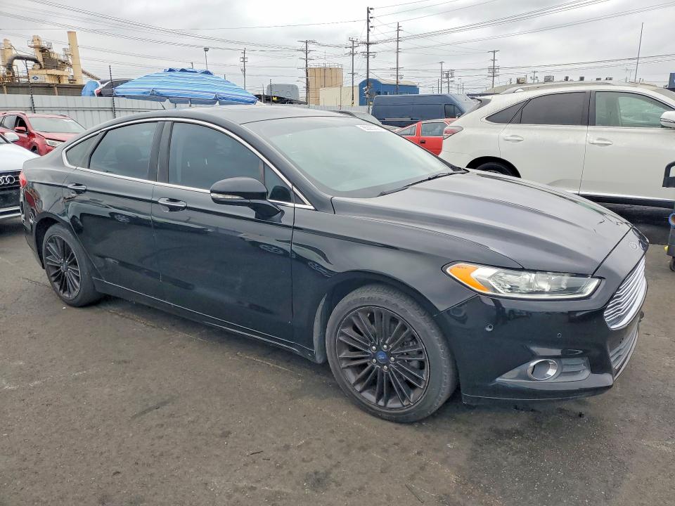 Photo 4 from auction – 2016 FORD FUSION with VIN 3FA6P0H9XGR247258