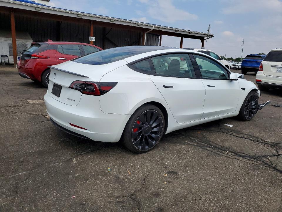 Photo 3 from auction – 2023 TESLA MODEL 3 with VIN 5YJ3E1EC4PF420671
