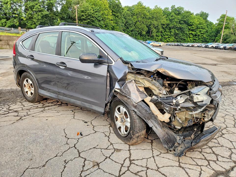 Photo 4 from auction – 2014 HONDA CR-V with VIN 2HKRM4H3XEH606188
