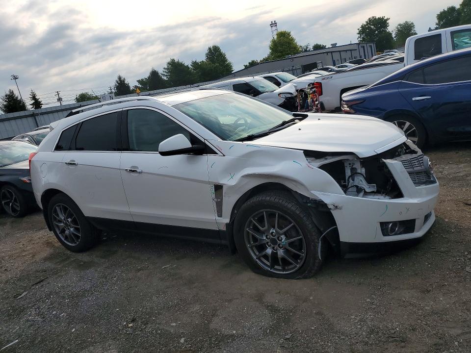 Photo 4 from auction – 2011 CADILLAC SRX with VIN 3GYFNFEY8BS634904
