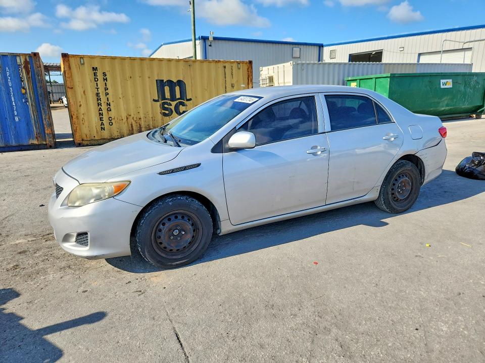 TOYOTA COROLLA 2010 with VIN 2T1BU4EE0AC517668 - Photo from auction