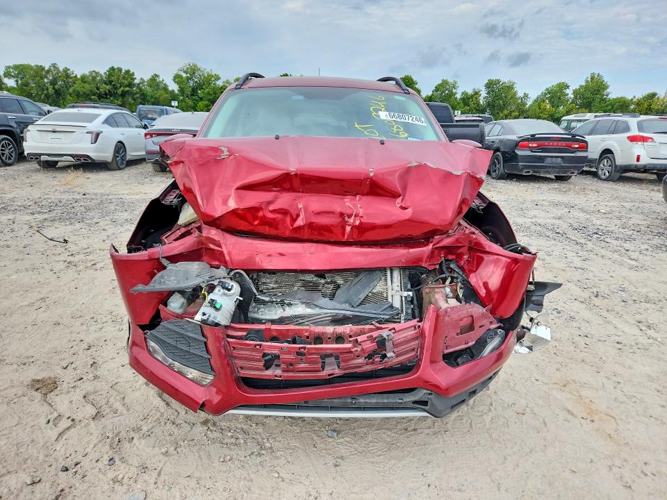 Photo 5 from auction – 2016 FORD ESCAPE with VIN 1FMCU0GX2GUC25992