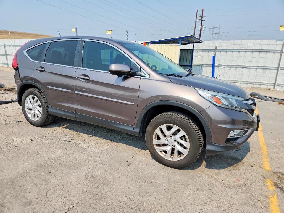 Photo 4 from auction – 2015 HONDA CR-V with VIN 2HKRM4H56FH680730