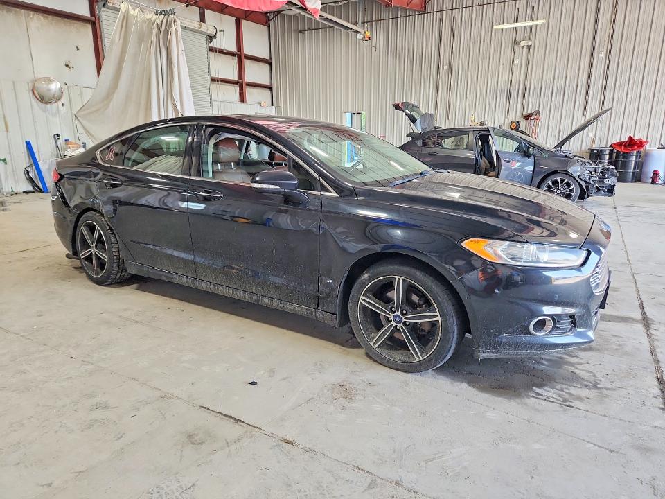 Photo 4 from auction – 2016 FORD FUSION with VIN 3FA6P0D9XGR150194