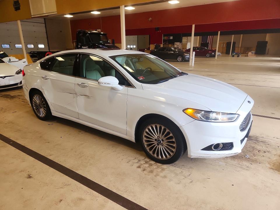 Photo 4 from auction – 2016 FORD FUSION with VIN 3FA6P0K97GR400252