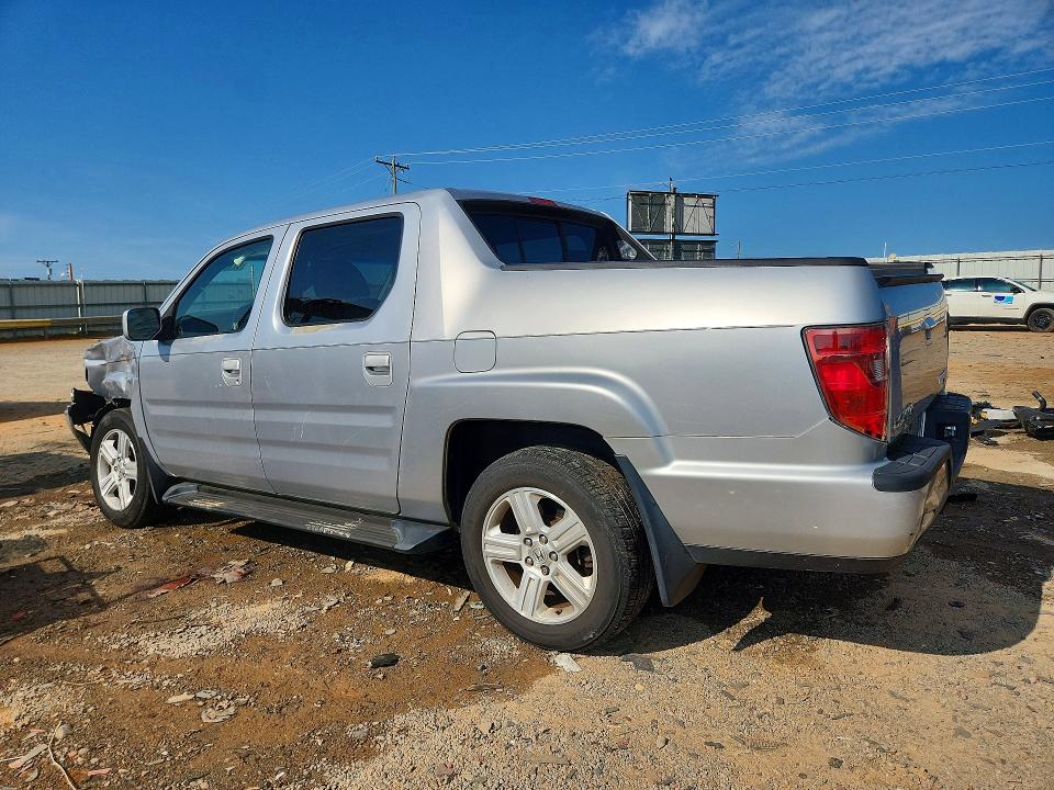 Снимка 2 от търг – 2010 HONDA RIDGELINE с VIN 5FPYK1F57AB011657