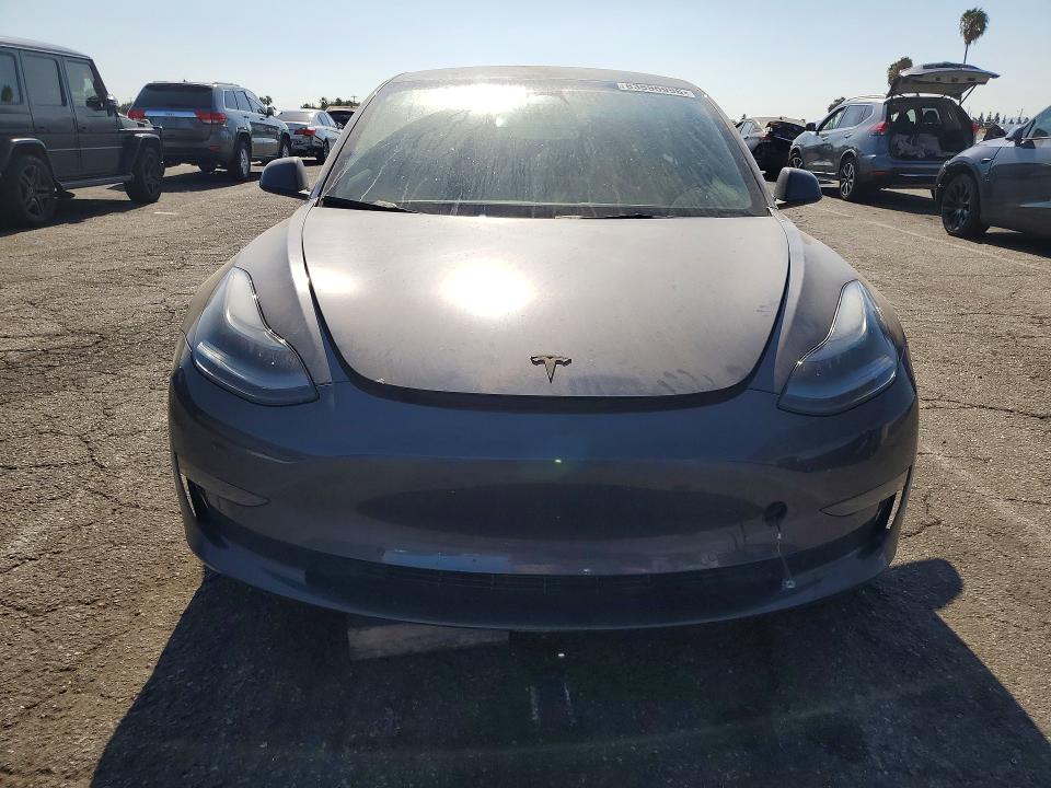 Photo 5 from auction – 2022 TESLA MODEL 3 with VIN 5YJ3E1EB7NF166796