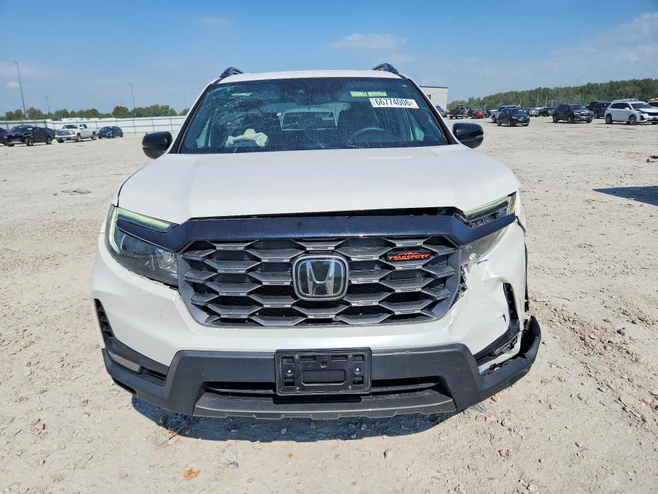 Photo 5 from auction – 2025 HONDA PASSPORT with VIN 5FNYF8H67SB012255