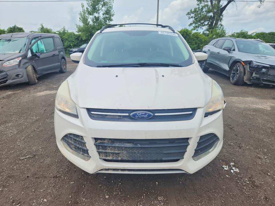 Photo 5 from auction – 2015 FORD ESCAPE with VIN 1FMCU9G94FUC49666
