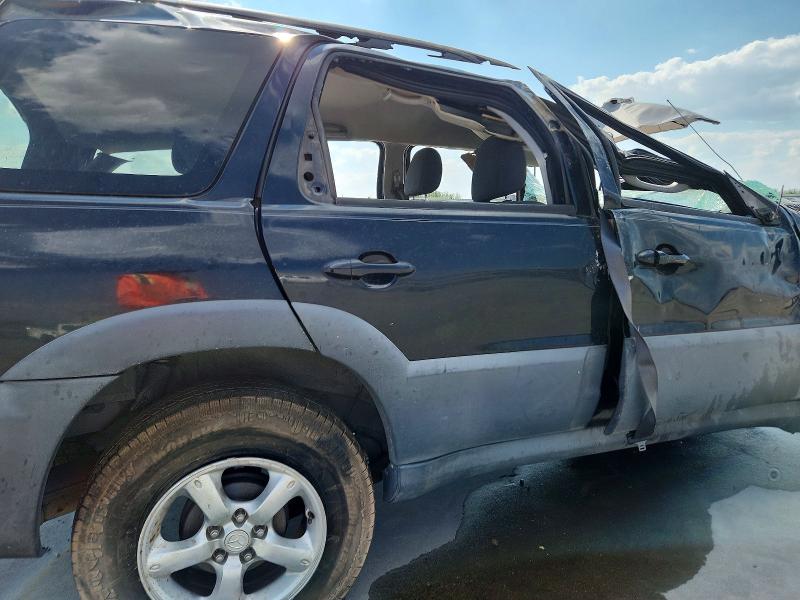 Photo 10 from auction – 2005 MAZDA TRIBUTE with VIN 4F2YZ02Z95KM54750