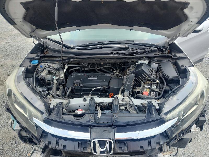 Photo 11 from auction – 2016 HONDA CR-V with VIN 2HKRM4H72GH673387