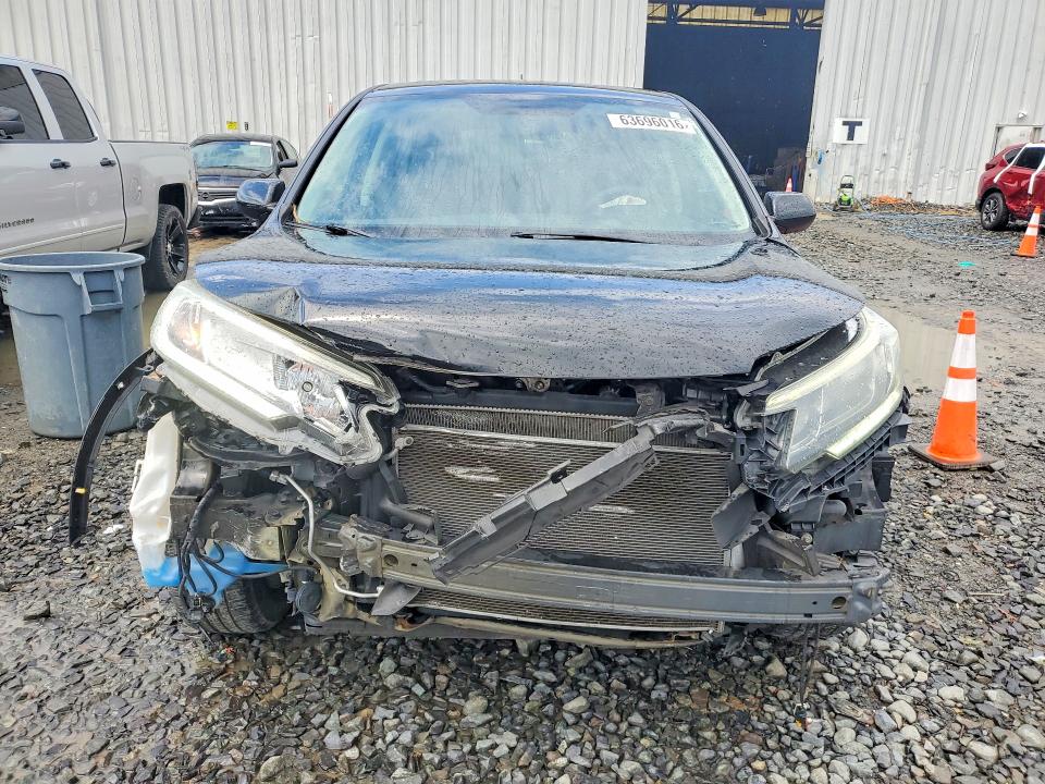 Photo 5 from auction – 2016 HONDA CR-V with VIN 3CZRM3H58GG704394