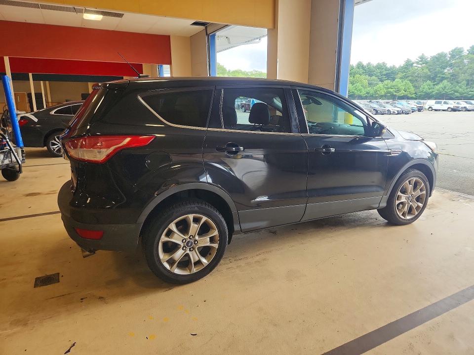 Photo 3 from auction – 2013 FORD ESCAPE with VIN 1FMCU9HX0DUD30268