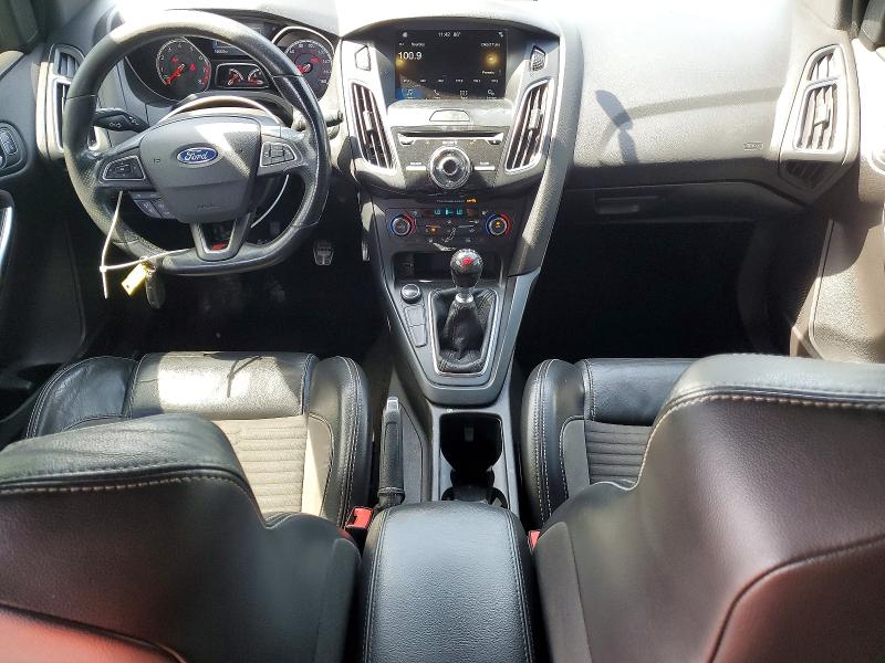 Foto 8 de la subasta – 2017 FORD FOCUS con VIN 1FADP3L96HL259942