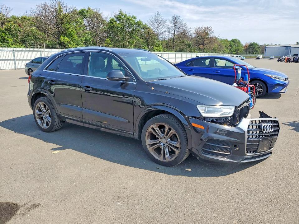 Photo 4 from auction – 2016 AUDI Q3 with VIN WA1EFCFSXGR025132