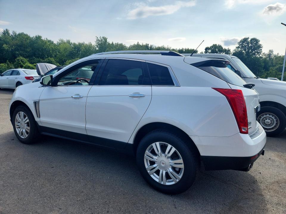 Photo 2 from auction – 2014 CADILLAC SRX with VIN 3GYFNBE34ES627112