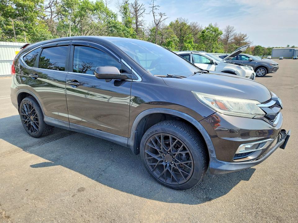 Photo 4 from auction – 2015 HONDA CR-V with VIN 2HKRM4H53FH657647