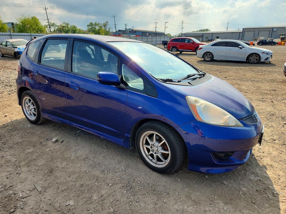 Photo 4 from auction – 2009 HONDA FIT with VIN JHMGE884X9S007737