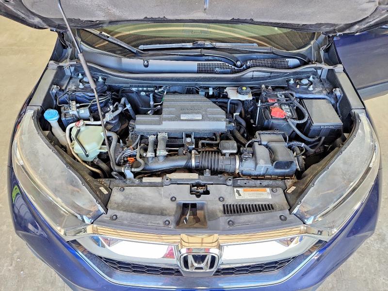 Photo 12 from auction – 2018 HONDA CR-V with VIN 7FARW2H53JE058094