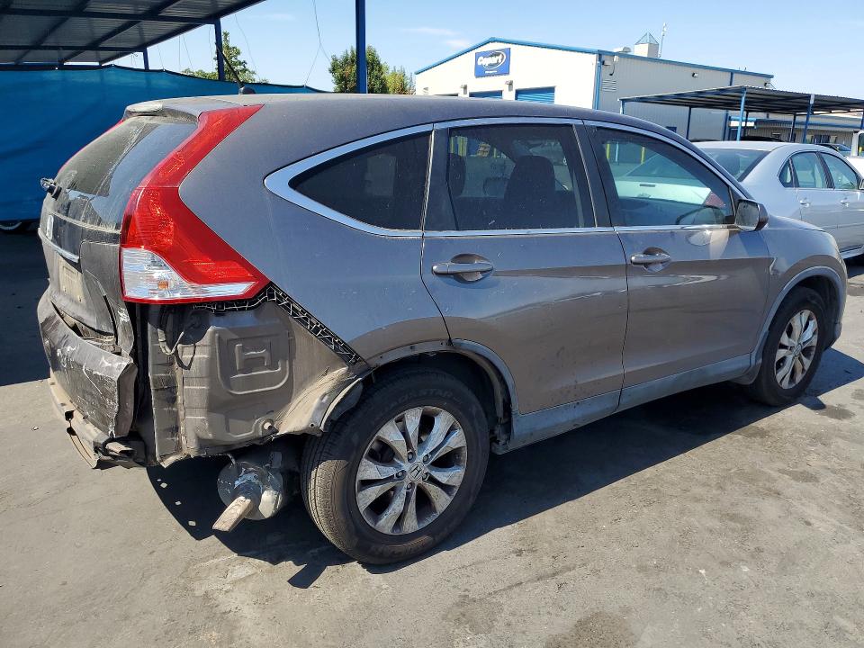 Photo 3 from auction – 2013 HONDA CR-V with VIN 3CZRM3H55DG703750