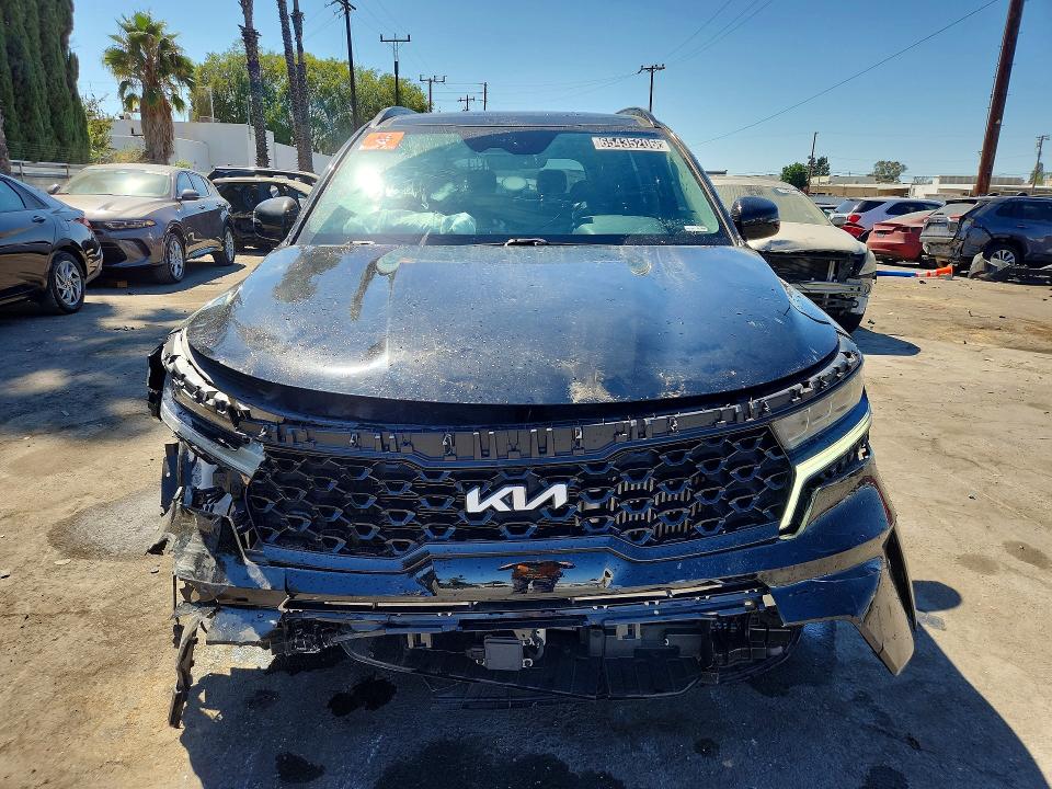 Photo 5 from auction – 2023 KIA SORENTO with VIN 5XYRK4LF2PG202951