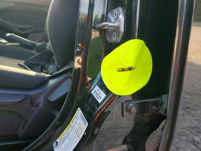 Photo 12 from auction – 2015 FORD FOCUS with VIN 1FADP3F27FL335258