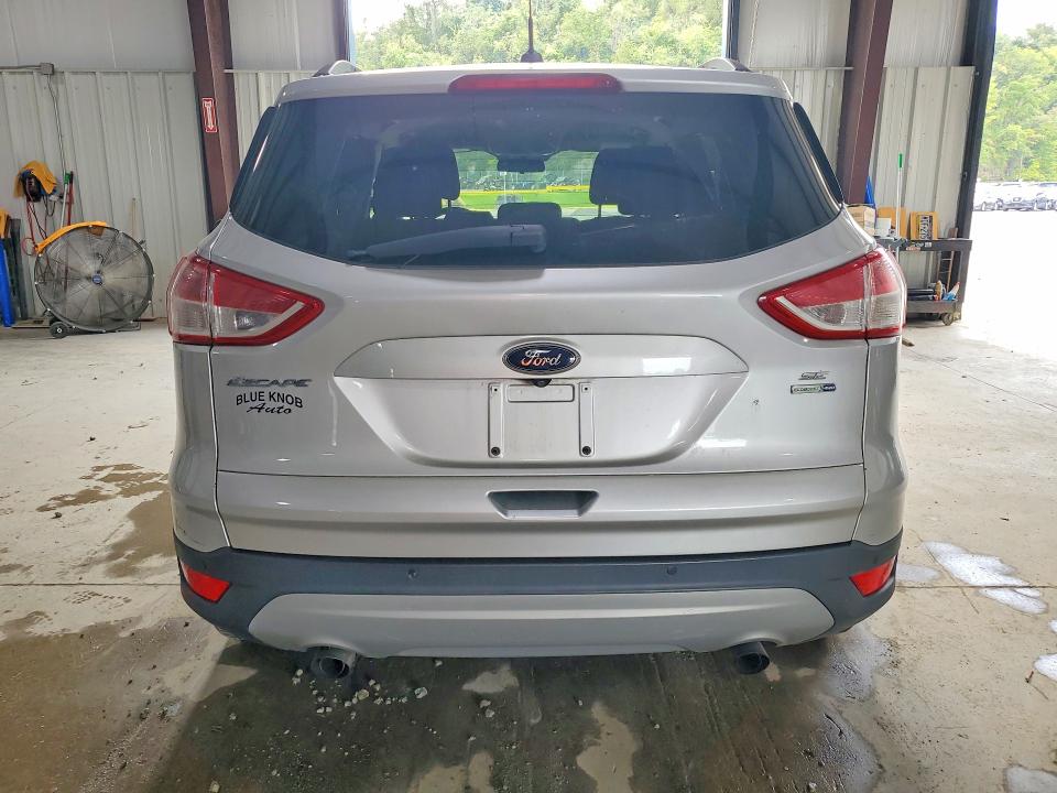 Photo 6 from auction – 2016 FORD ESCAPE with VIN 1FMCU9GX3GUB10404