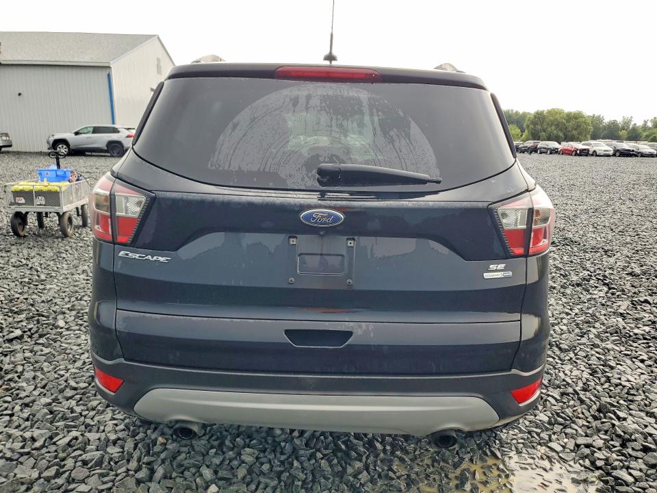 Photo 6 from auction – 2018 FORD ESCAPE with VIN 1FMCU9GD0JUB29182